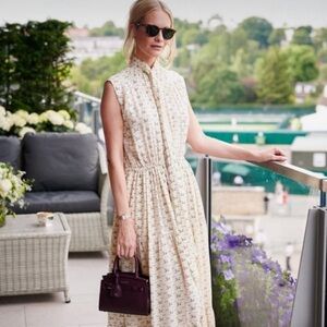 Elegant Cream Sleeveless Mini Dress